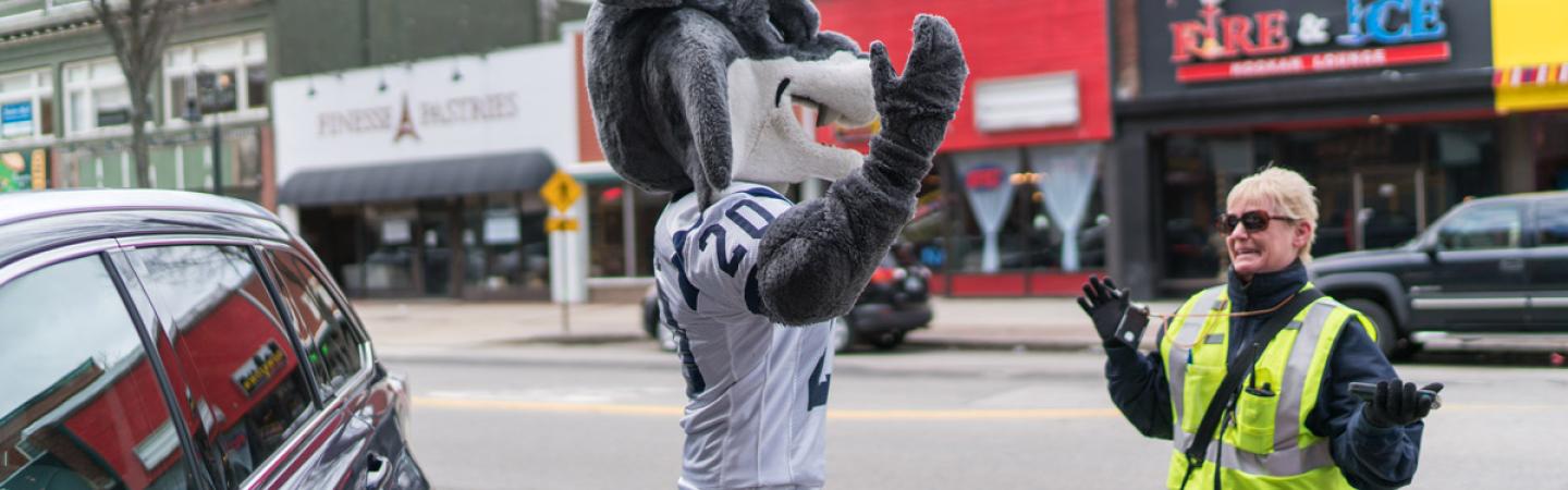 unh manchester mascot and parking officer