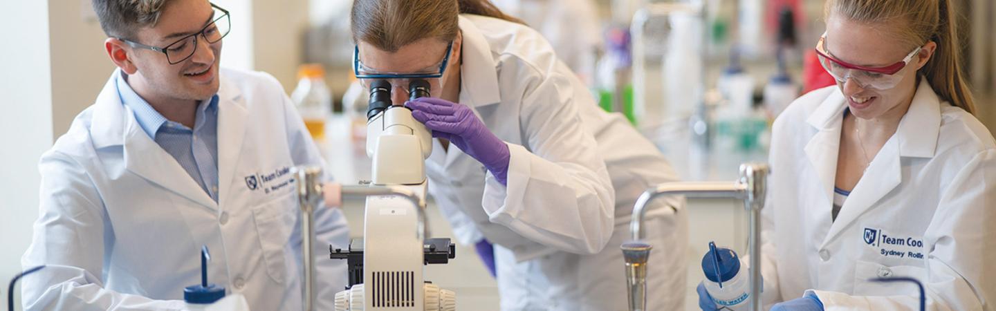 UNH Manchester Academics Students in Biology Lab