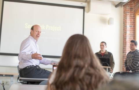 James Ramsay, professor of security studies, teaches students at UNH Manchester