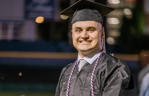 Computer information systems alumnus Kyle Kalantzis '22 at UNH Manchester's 2022 commencement