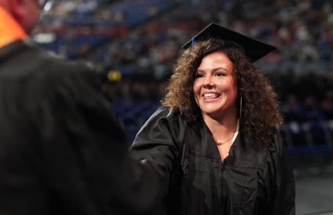 Biological sciences alumna Madison McLaughlin '23 at UNH Manchester commencement