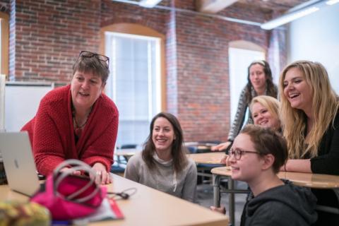 Laurie Shaffer, assistant professor of ASL/English interpreting at UNH Manchester, working with students