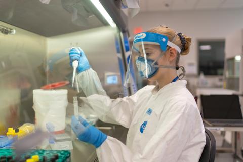 Isabelle Laizure, biotechnology student, working in UNH Manchester's COVID lab