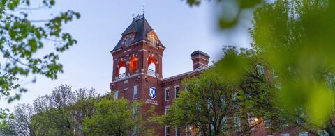 unh manchester tower in the evening