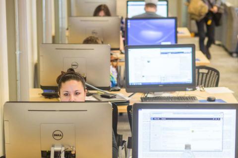 unh manchester students in the computer lab